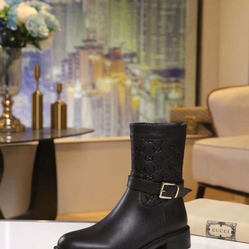 G*u*i boots